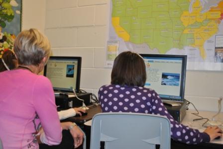 Teacher helping students 
