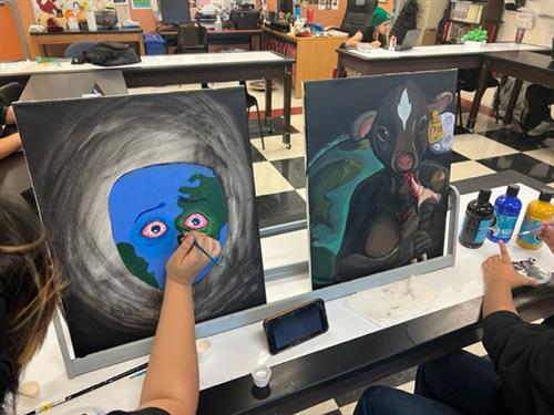  Two of our juniors are finishing up their summative assignment in Environmental Science. The painti