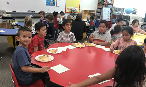 students eating in classroom 